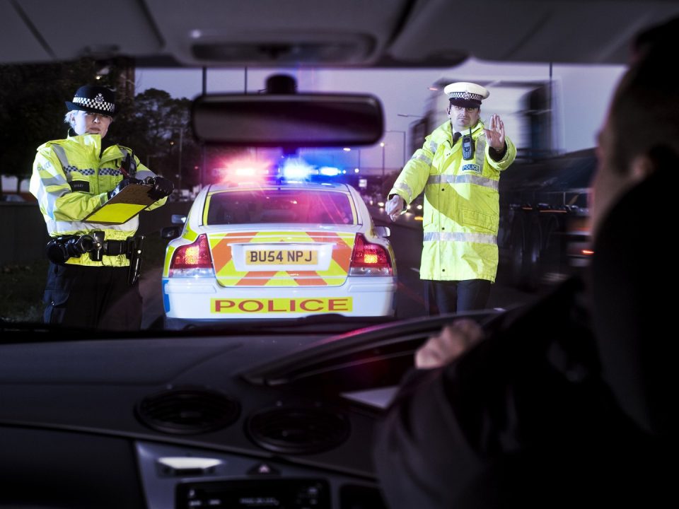 Police stop a driver suspected of drink driving
