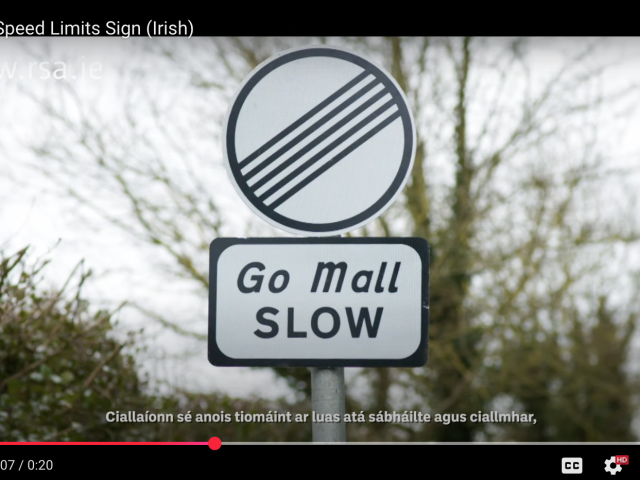 A speed sign in Ireland requiring drivers to drive slow.